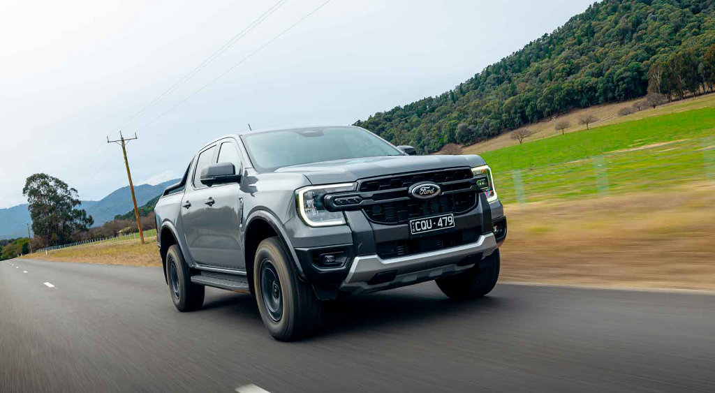 A Ford Ranger on the road.