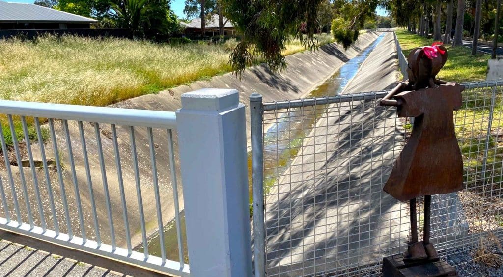 Little Marion peering into Sturt River.