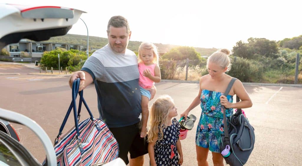 A family packing their car.