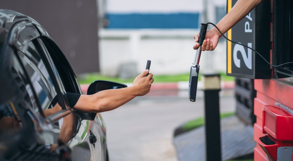 Paying with phone at fast food drive through