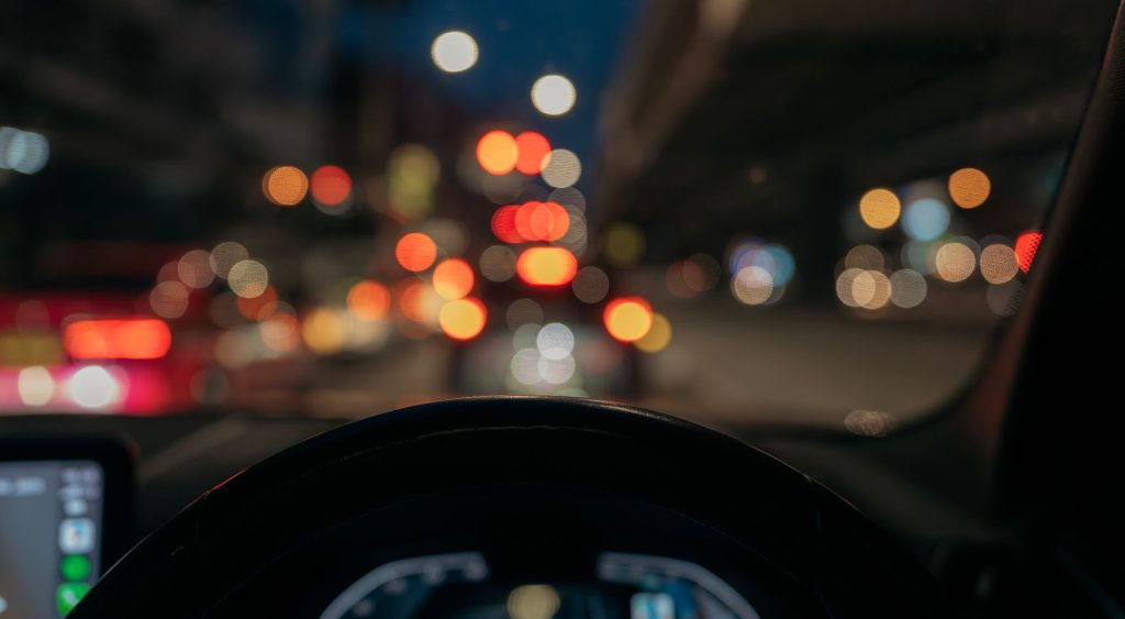 Street lights on dark road,