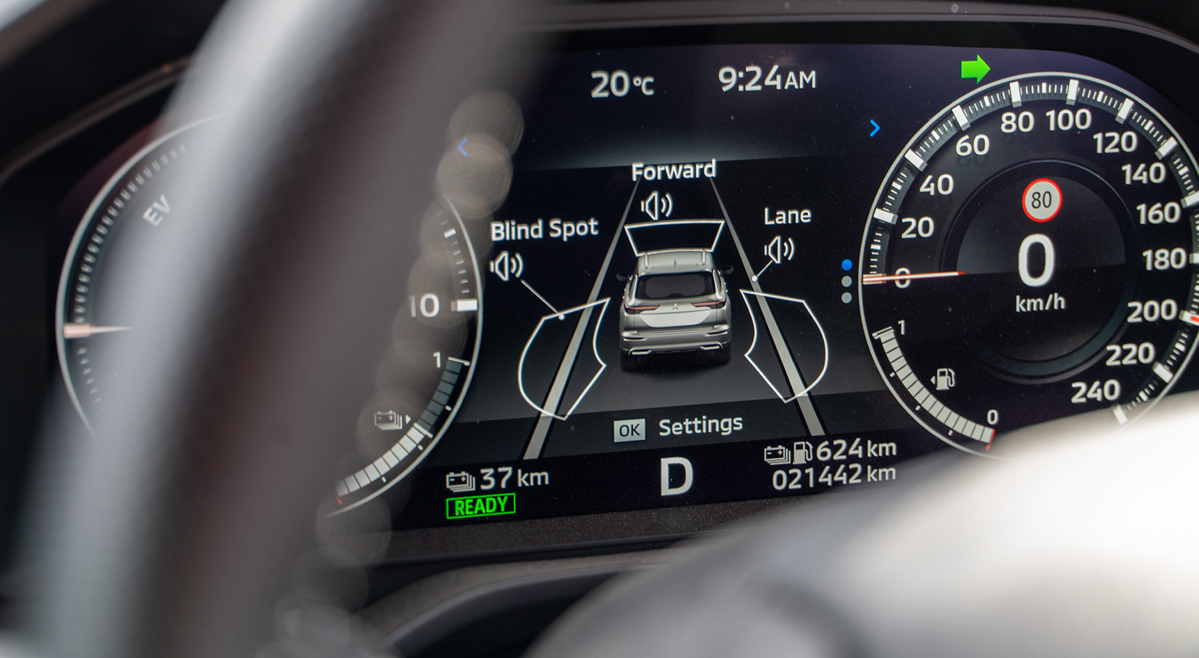 Dashboard of a modern vehicle with lane keeping, blind spot monitoring, and other warning functions