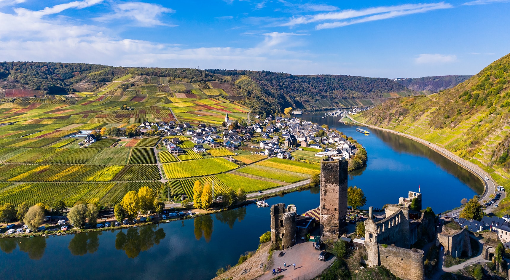 A ship cruising through Germany on the Moselle River