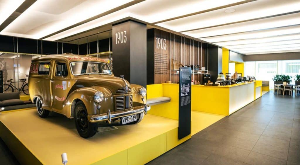 Yellow cafe with a car inside.