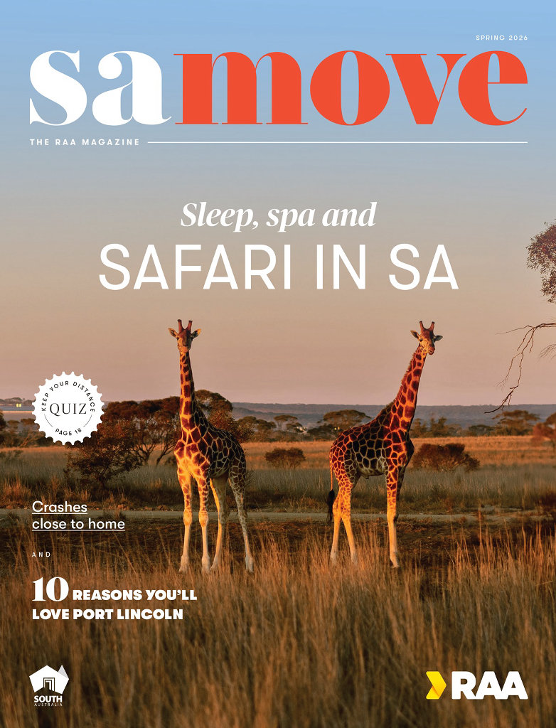 Magazine cover with two giraffes