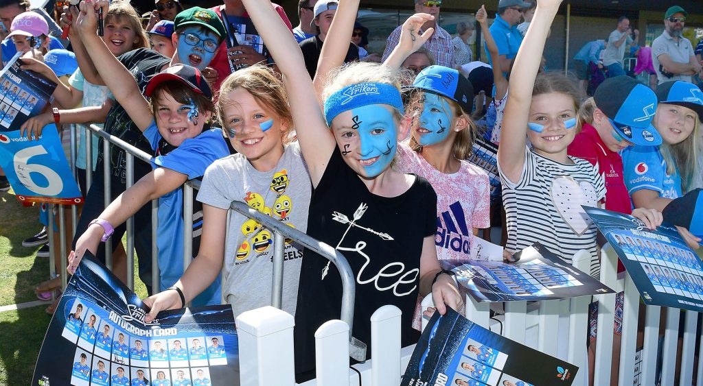 Kids cheering at an Adelaide Strikers game