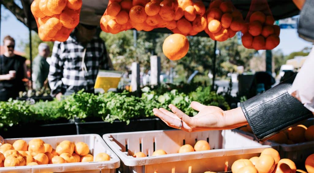 An orange seller at the Willunga Farmer's Market